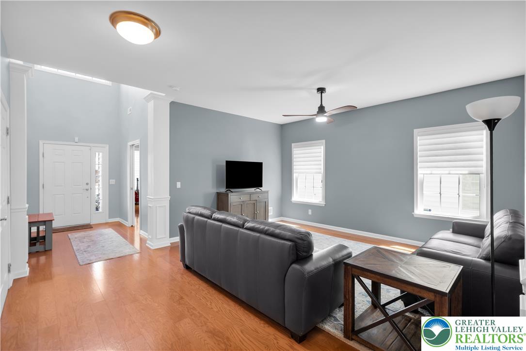 1011 Resolution Drive Bethlehem, PA 18017 - Photo 20 of 49 a living room with furniture and a flat screen tv