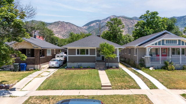 2862 Fowler Avenue Ogden, UT 84403 - Photo 20 of 23 Gray siding exterior with contrasting white trim