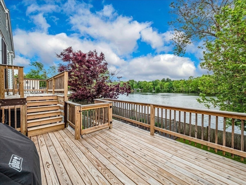 7 Ell Road Holbrook, MA 02343 - Photo 5 of 34 a view of a balcony with wooden floor
