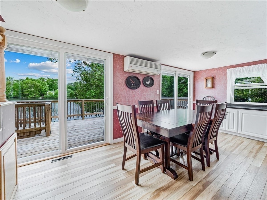 7 Ell Road Holbrook, MA 02343 - Photo 8 of 34 a view of a dining room with furniture window and wooden floor