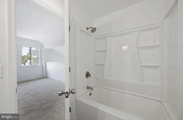 a bathroom with a bathtub