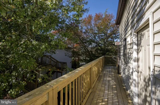 a view of balcony and wooden floor