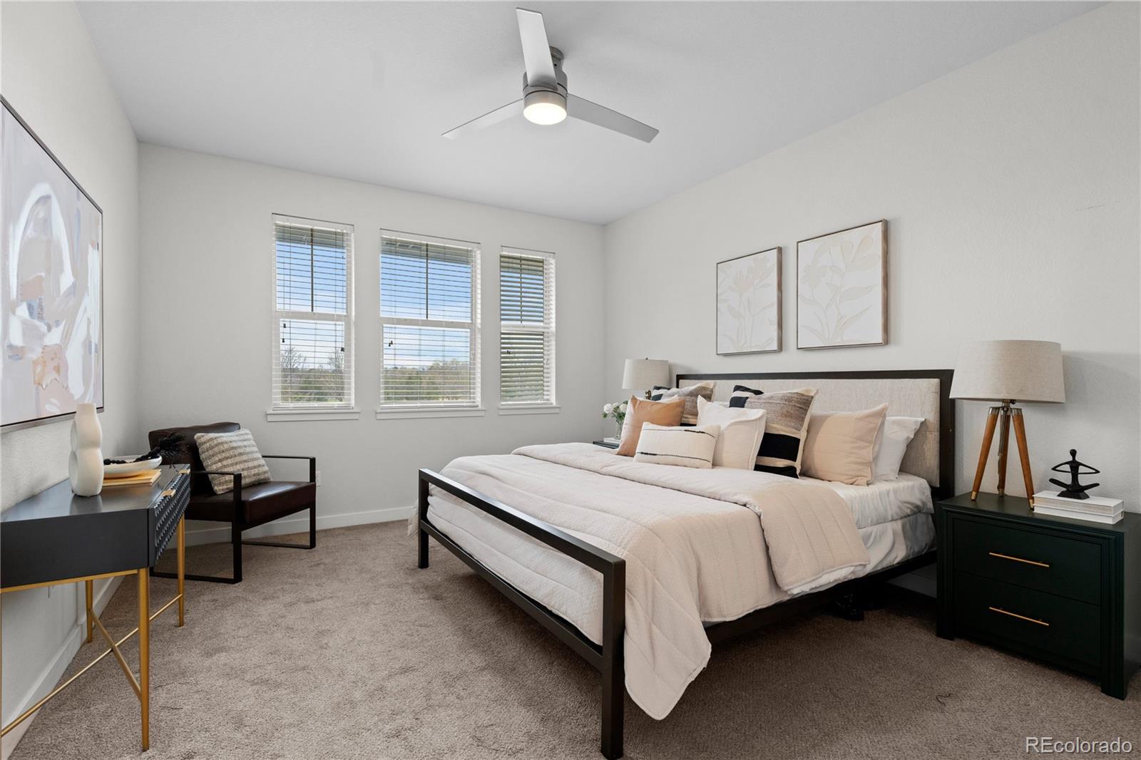 188 South Locust Street Denver, CO 80224 - Photo 13 of 29 a bedroom with a bed and a window