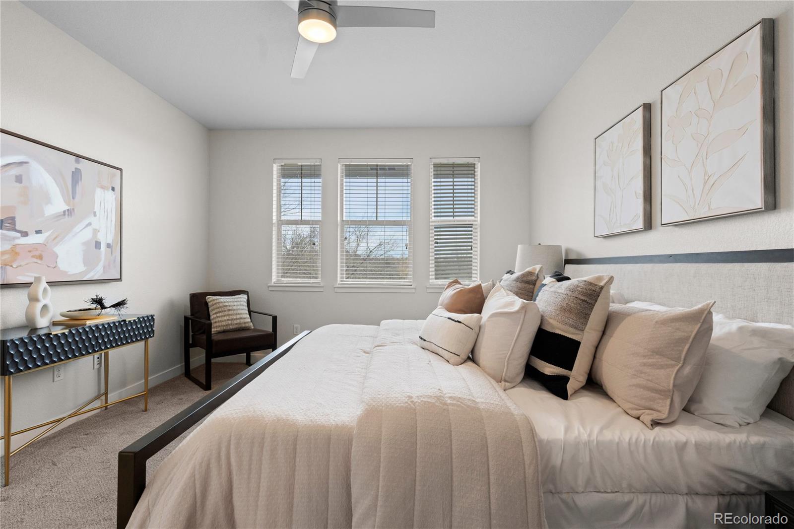 188 South Locust Street Denver, CO 80224 - Photo 14 of 29 a bedroom with a bed and a window