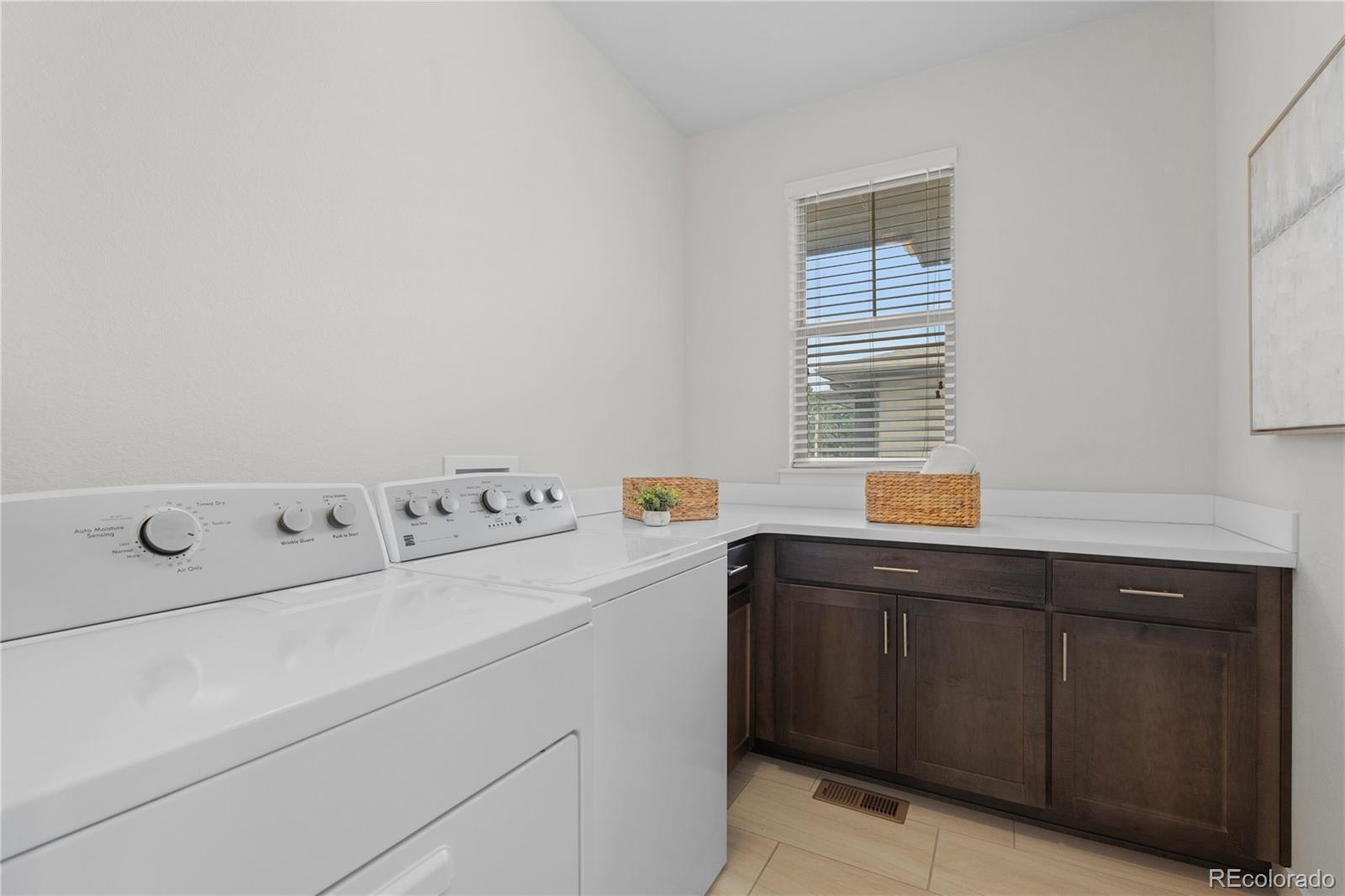 188 South Locust Street Denver, CO 80224 - Photo 21 of 29 a utility room with dryer and washer