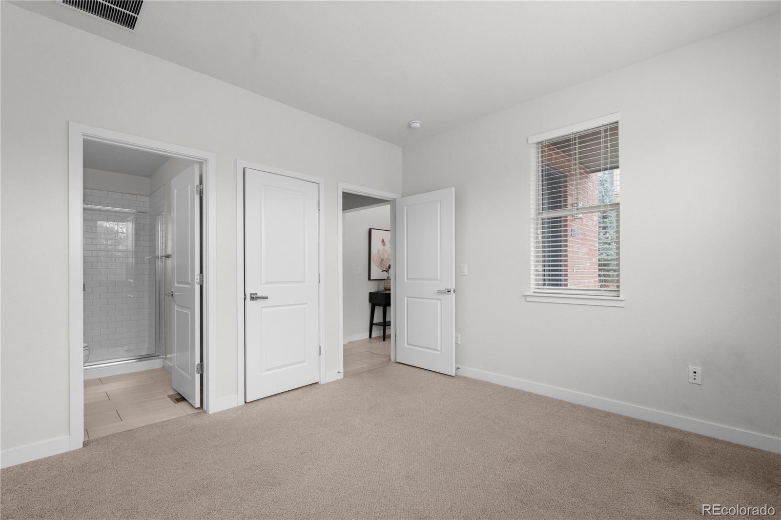 188 South Locust Street Denver, CO 80224 - Photo 23 of 29 a view of empty room with windows and entryway