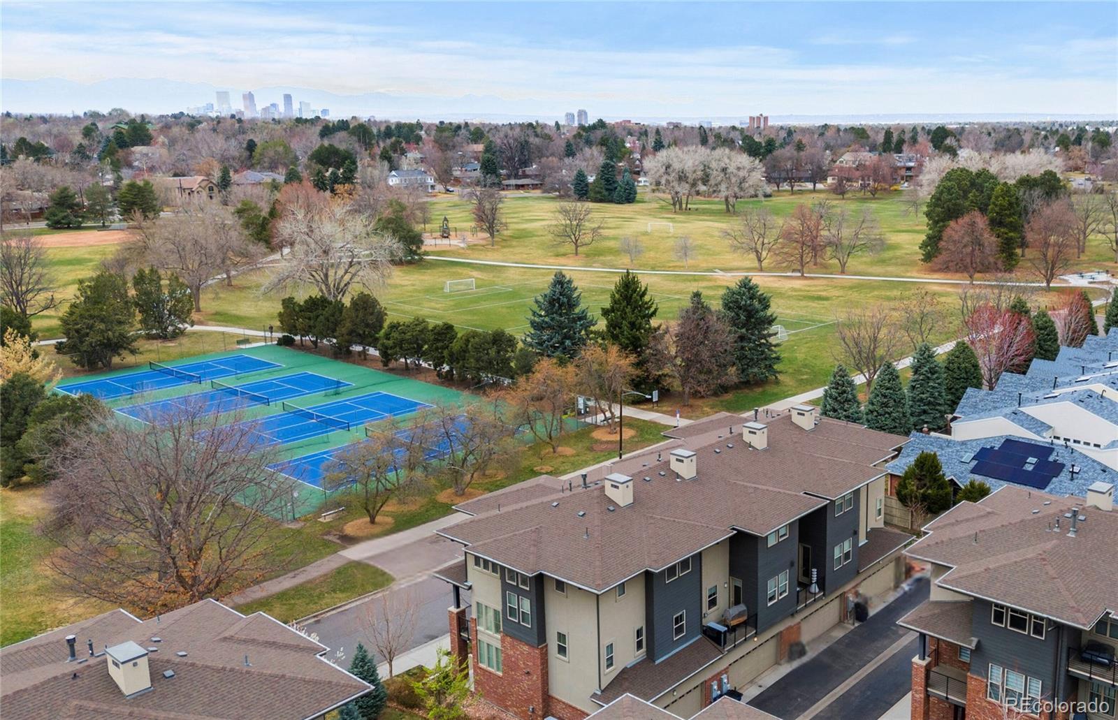 188 South Locust Street Denver, CO 80224 - Photo 26 of 29 an aerial view of a house with a lake view