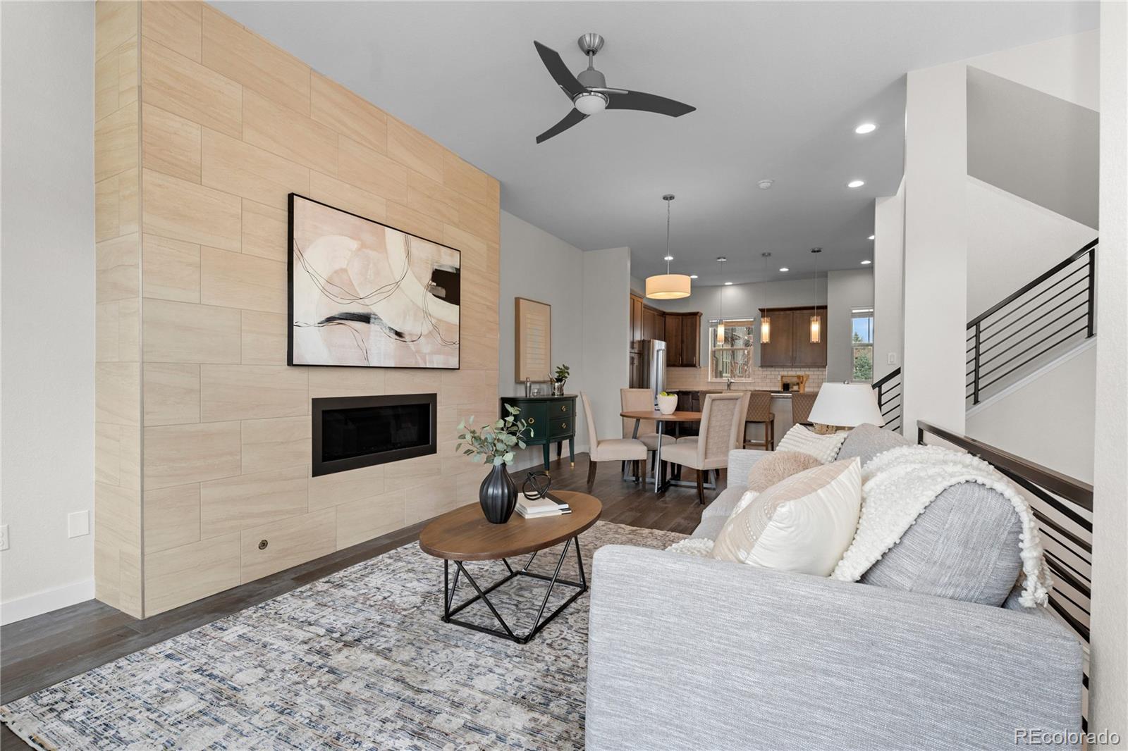 188 South Locust Street Denver, CO 80224 - Photo 10 of 29 a living room with furniture and a fireplace