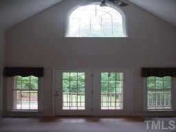 1100 John Oakes Road Timberlake, NC 27583 - Photo 3 of 7 a view of an empty room with a window