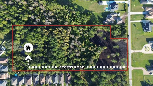a living room with furniture rug and wooden floor