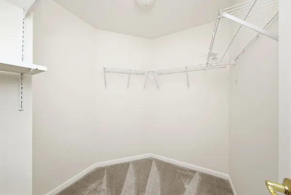 a view of small space with racks on the wall