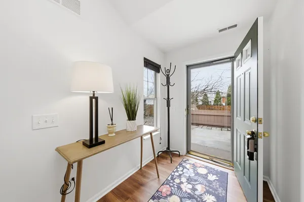 a view of room with window and hardwood floor