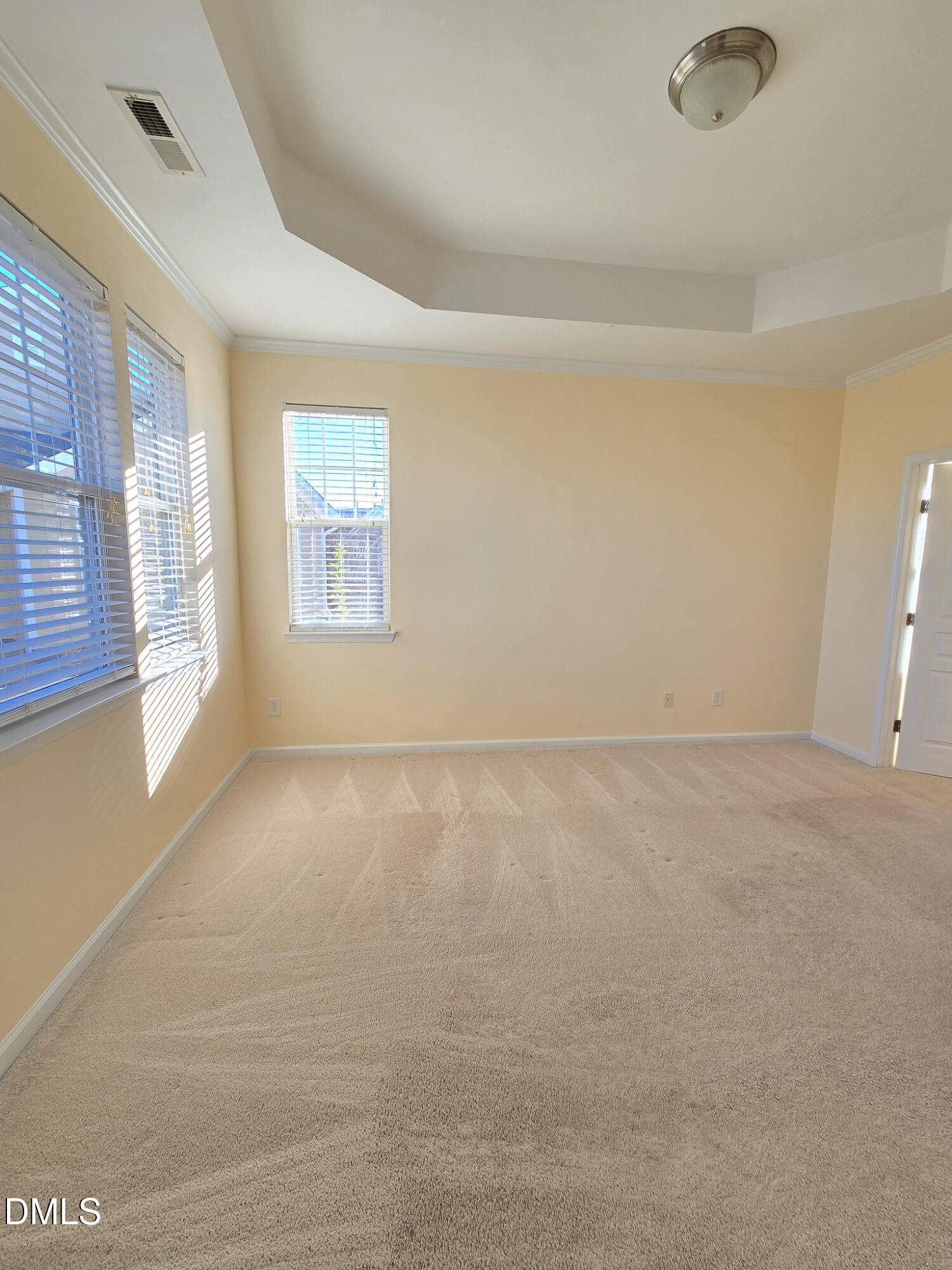 10104 Raven Tree Drive Raleigh, NC 27617 - Photo 14 of 33 a view of an empty room with a window