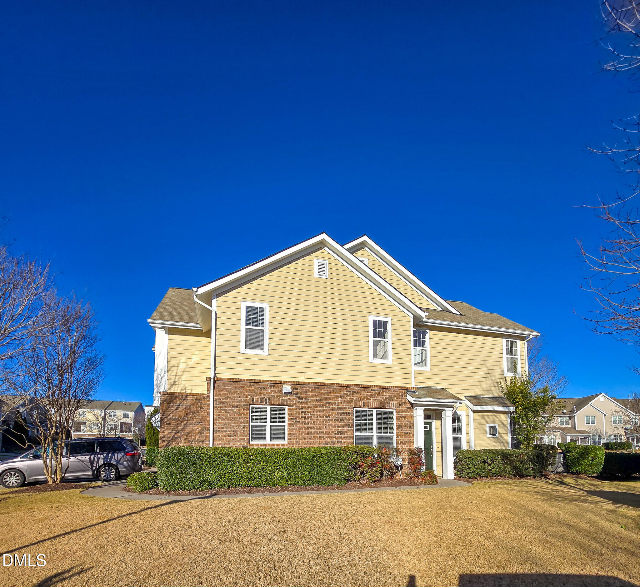 10104 Raven Tree Drive Raleigh, NC 27617 - Photo 2 of 33 a front view of a house with a garden