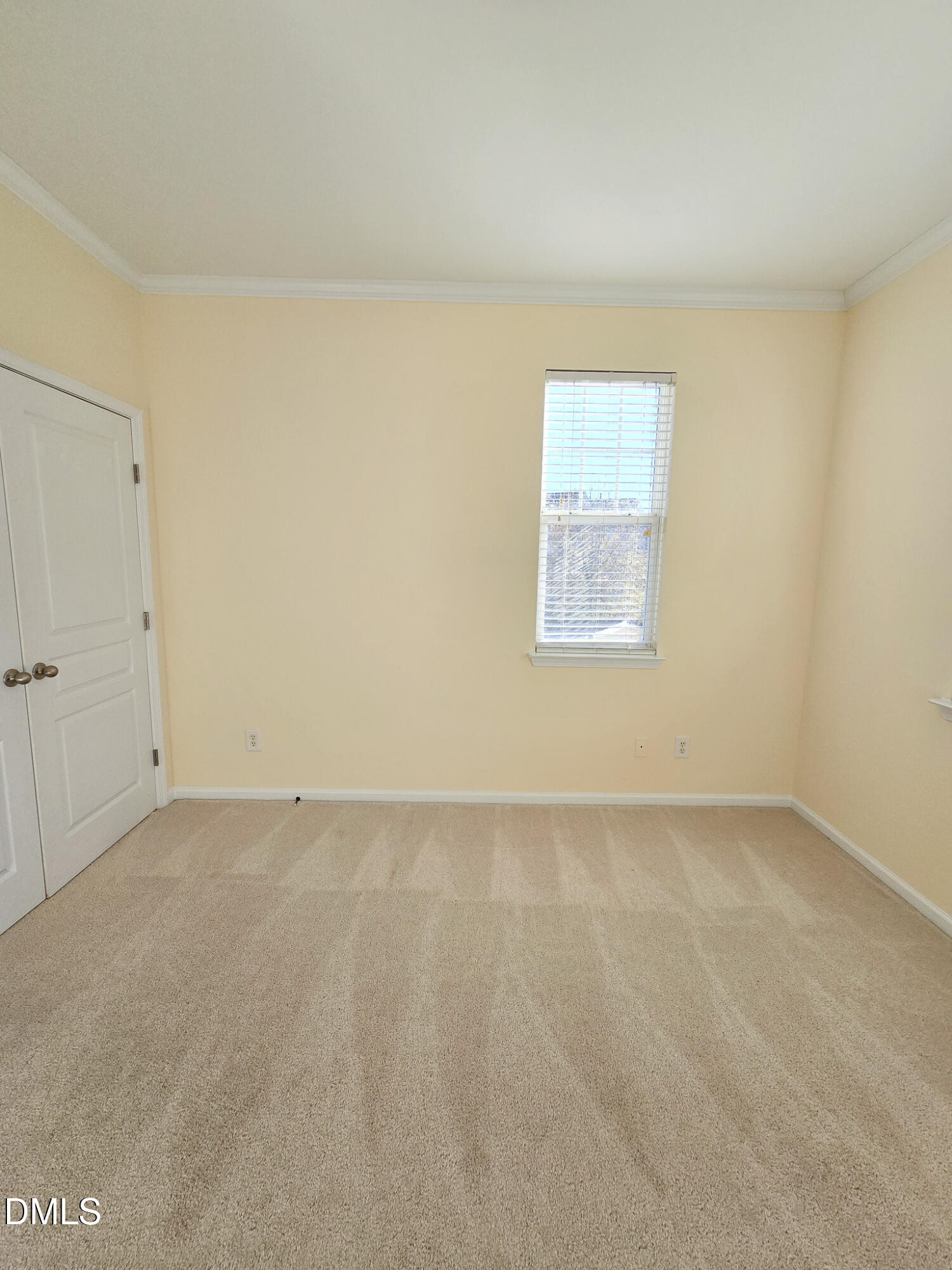 10104 Raven Tree Drive Raleigh, NC 27617 - Photo 22 of 33 an empty room with a window