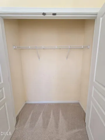 a view of small space with racks on the wall