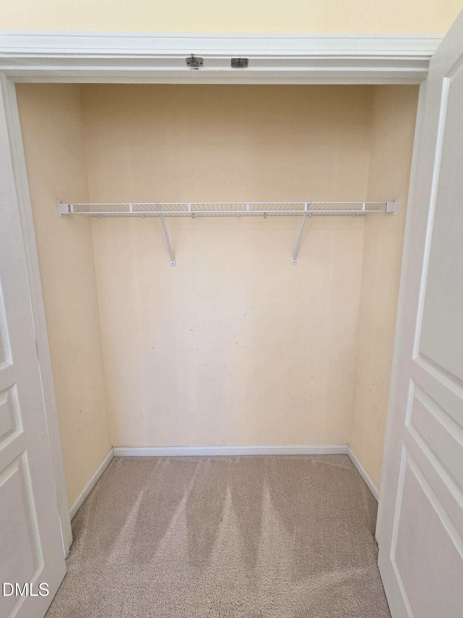 10104 Raven Tree Drive Raleigh, NC 27617 - Photo 23 of 33 a view of small space with racks on the wall