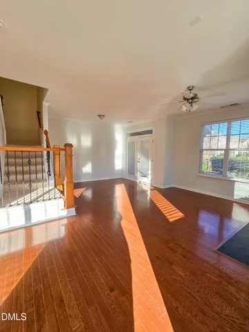 a view of a living room and dining room