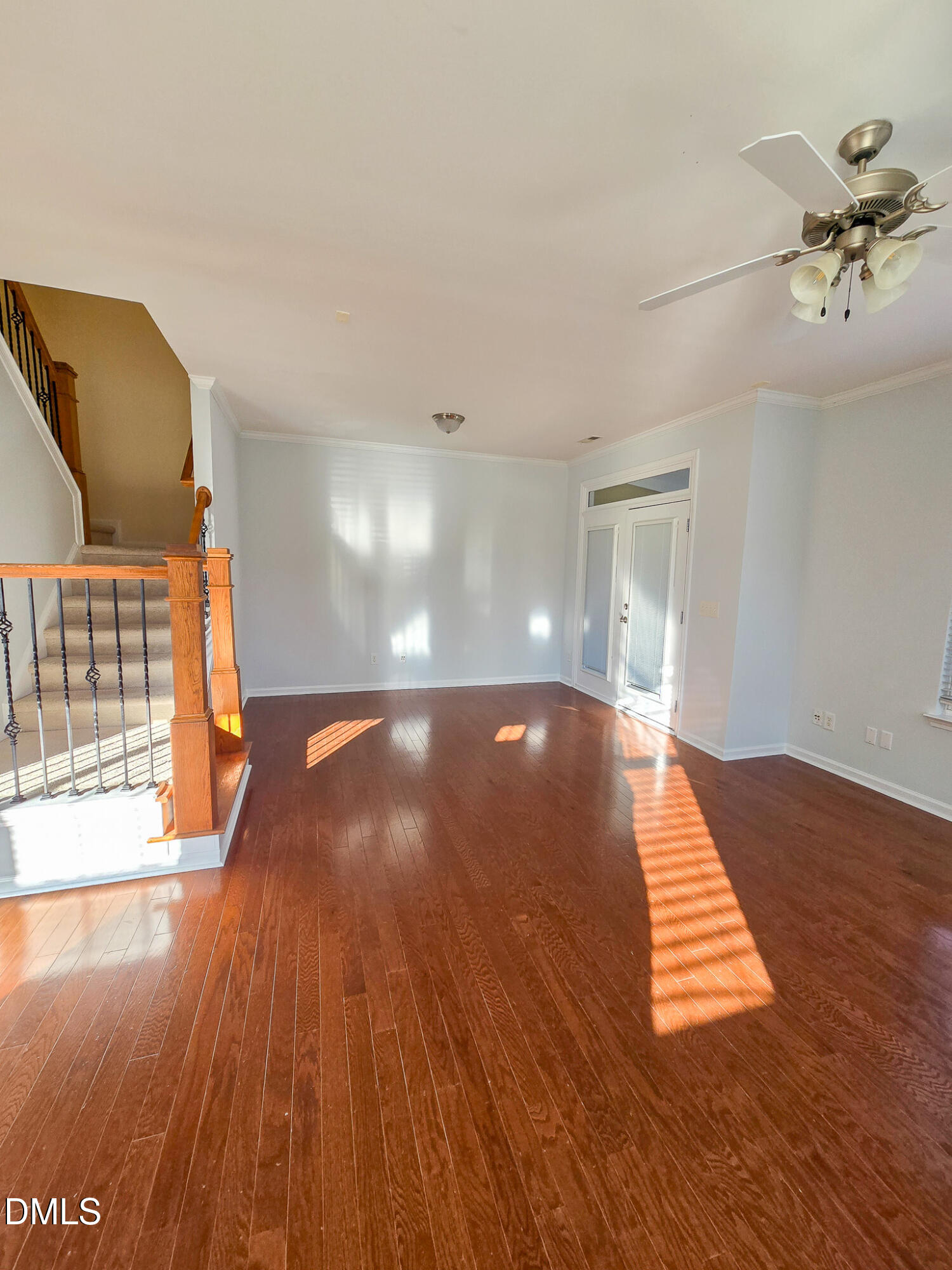 10104 Raven Tree Drive Raleigh, NC 27617 - Photo 5 of 33 a view of an empty room with wooden floor