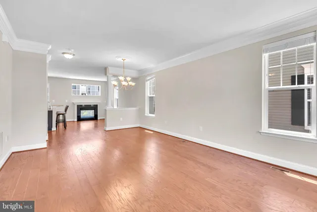 a view of a kitchen with a sink and a window