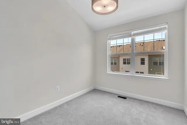 a bathroom with a sink toilet vanity tub and shower
