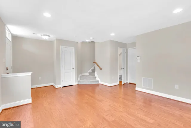 a view of empty room with a sink