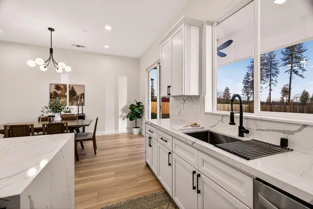 a bedroom with a bed and dresser