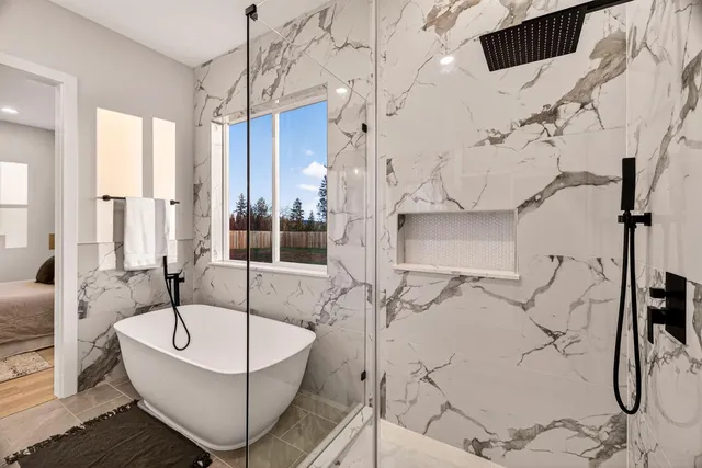 a bathroom with double vanity sink and a mirror