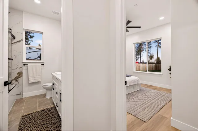 a view of house with outdoor space and sitting area