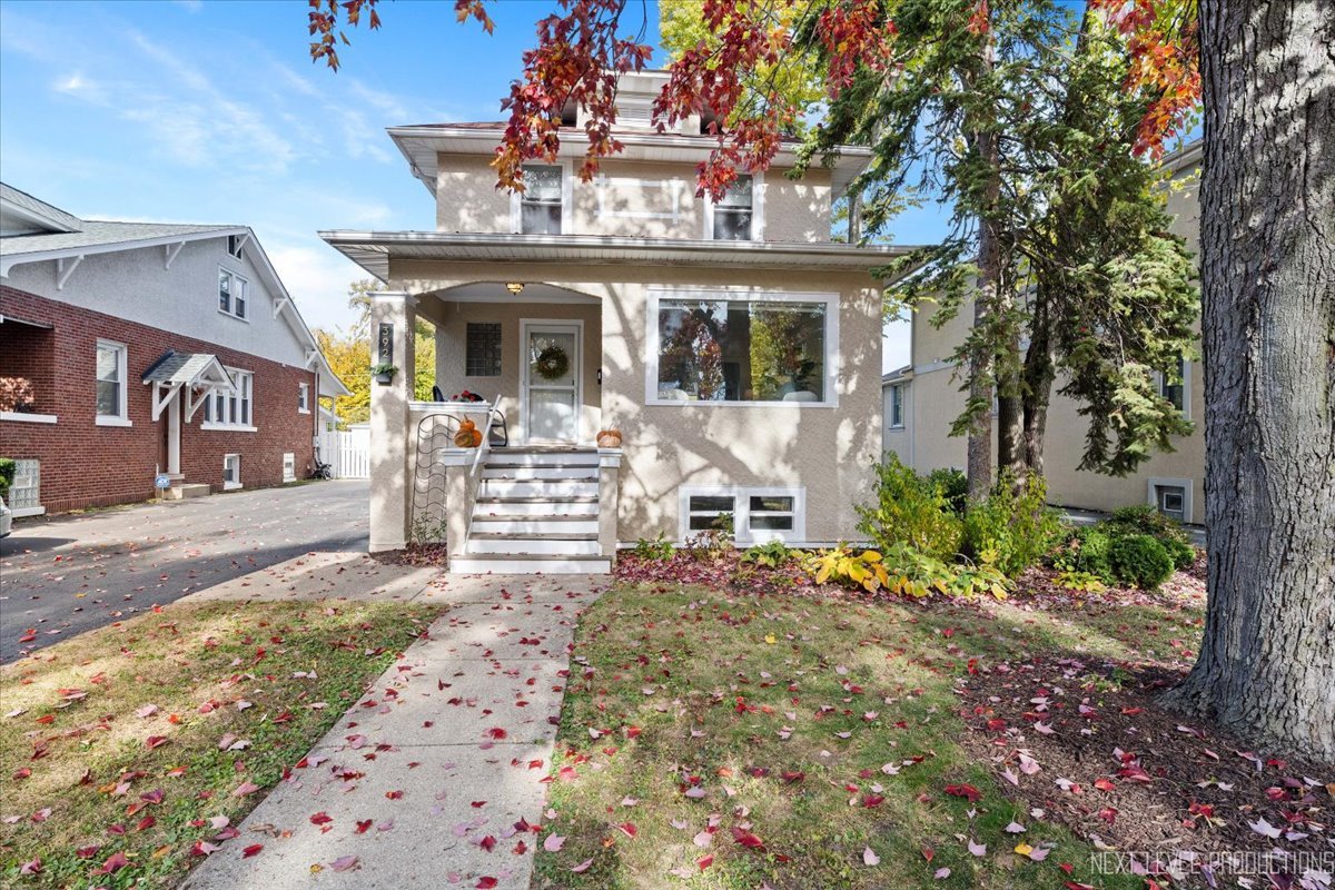 392 Herrick Road Riverside, IL 60546 - Photo 1 of 32 a view of a house with a patio