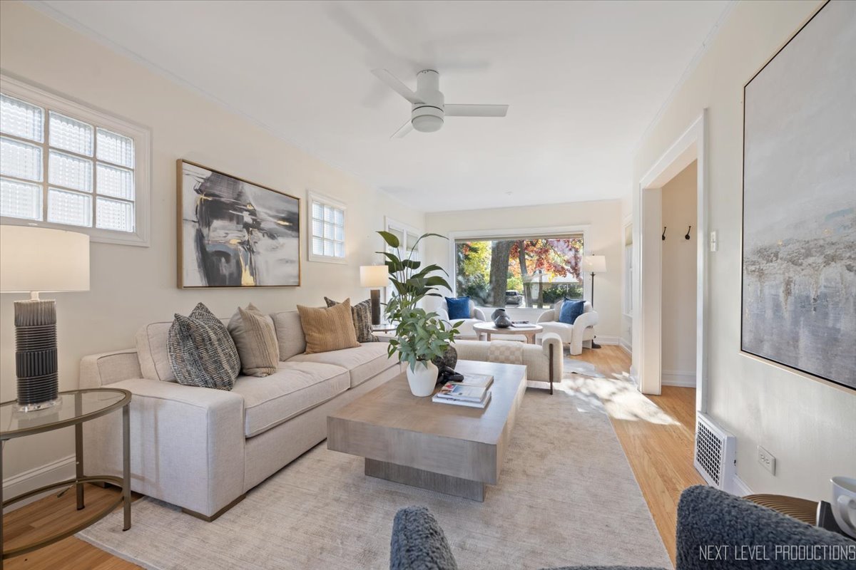 392 Herrick Road Riverside, IL 60546 - Photo 7 of 32 a living room with furniture and a large window
