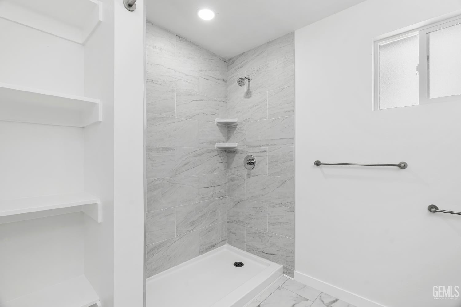 Undisclosed Address Bakersfield, CA 93305 - Photo 13 of 24 a bathroom with a shower