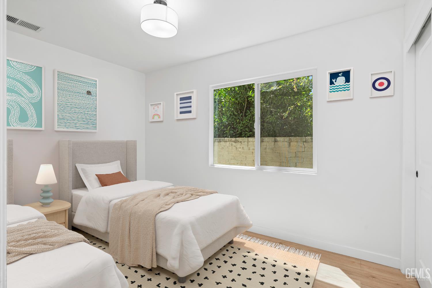 Undisclosed Address Bakersfield, CA 93305 - Photo 14 of 24 a bedroom with a bed and a window