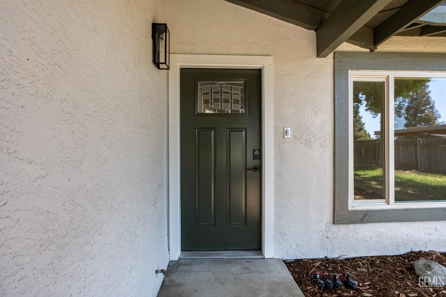 Undisclosed Address Bakersfield, CA 93305 - Photo 3 of 24 a view of a entryway door front of a house