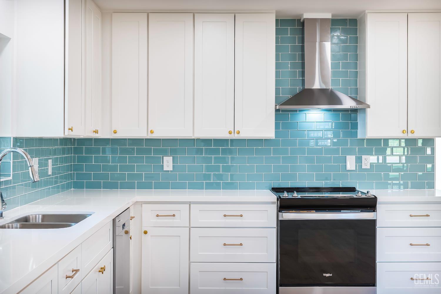 Undisclosed Address Bakersfield, CA 93305 - Photo 7 of 24 a kitchen with a sink and cabinets