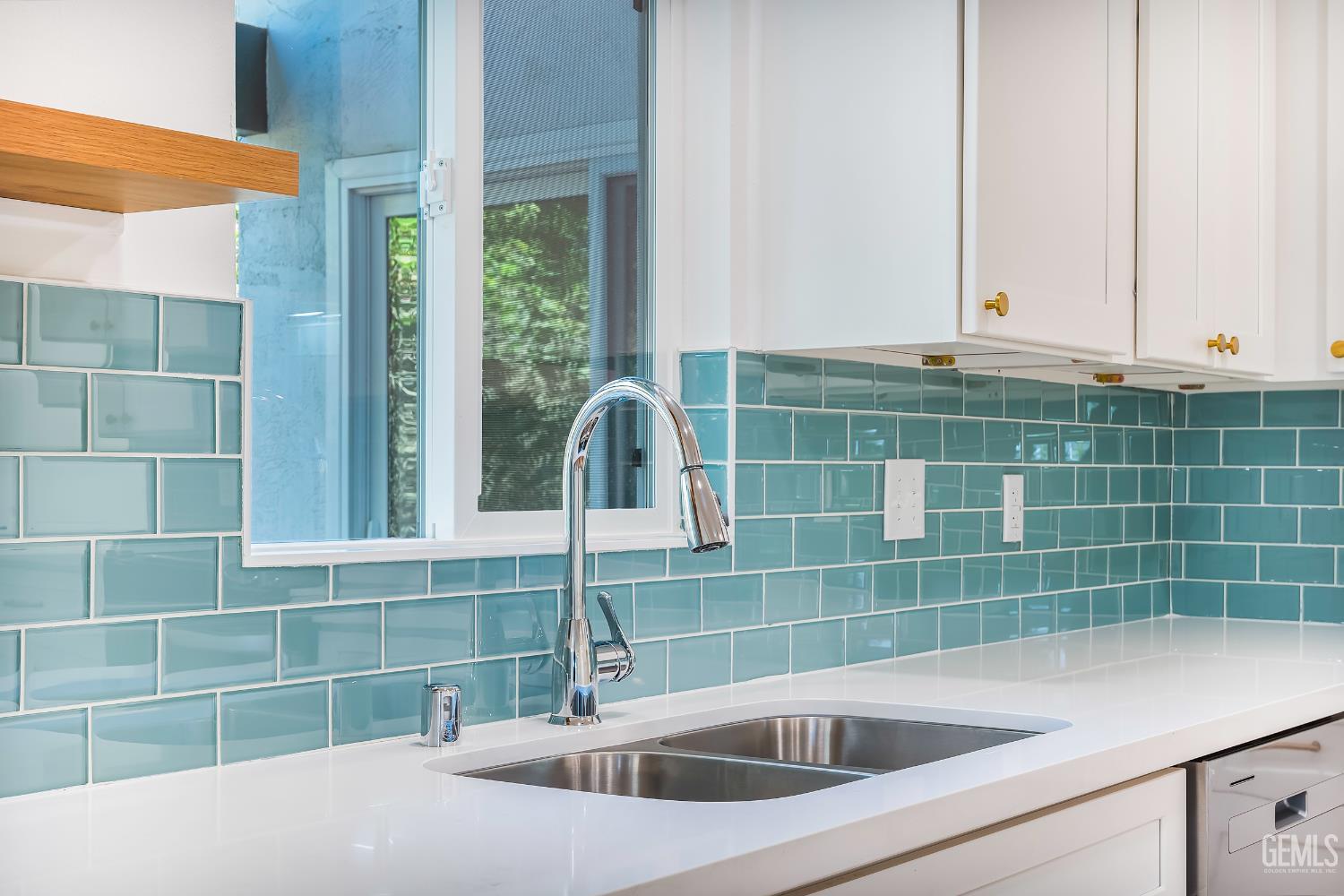 Undisclosed Address Bakersfield, CA 93305 - Photo 9 of 24 a bathroom with a sink and a window