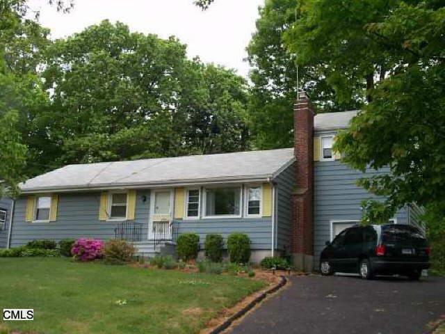 7 Flintlock Road Norwalk, CT 06850 - Photo 1 of 1 a view of a house with a yard