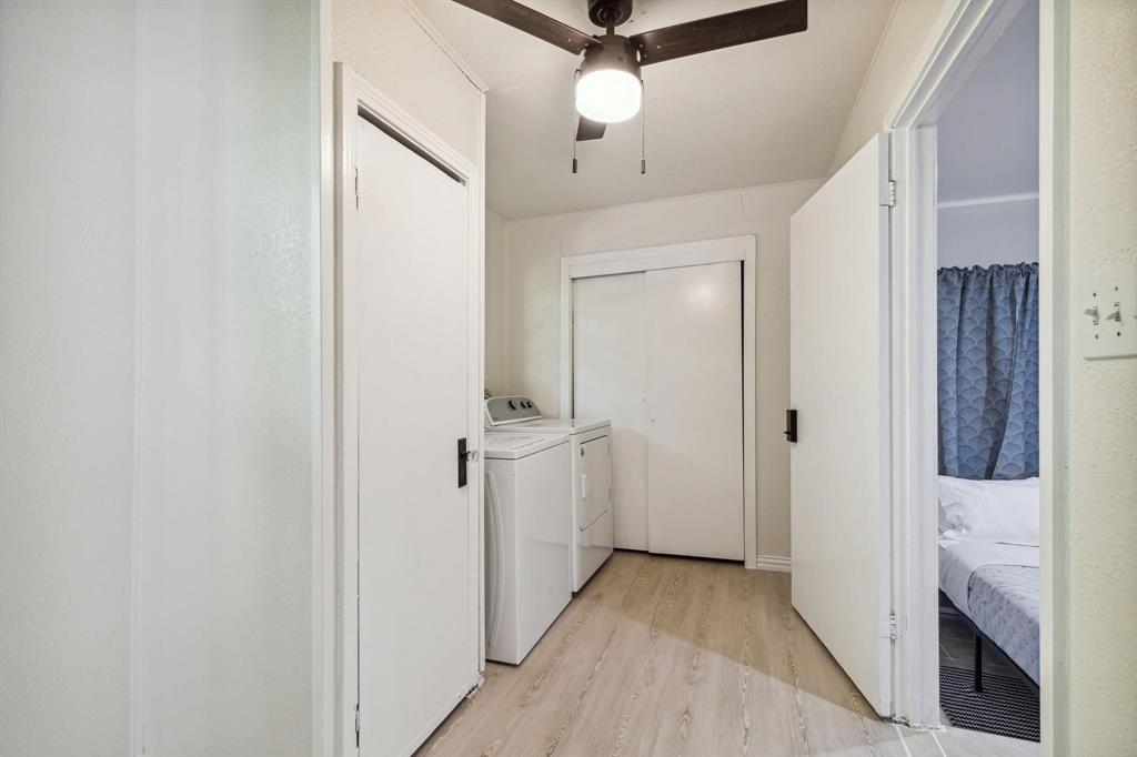 2435 West 10th Street Dallas, TX 75211 - Photo 20 of 38 a view of hallway with chandelier