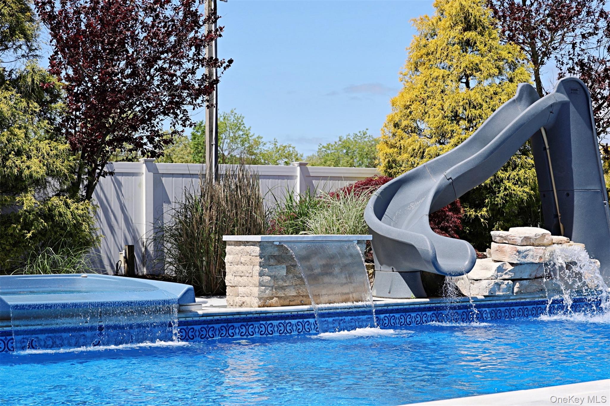 56861 Private Rd B (main) Southold, NY 11971 - Photo 4 of 34 View of pool with a water slide
