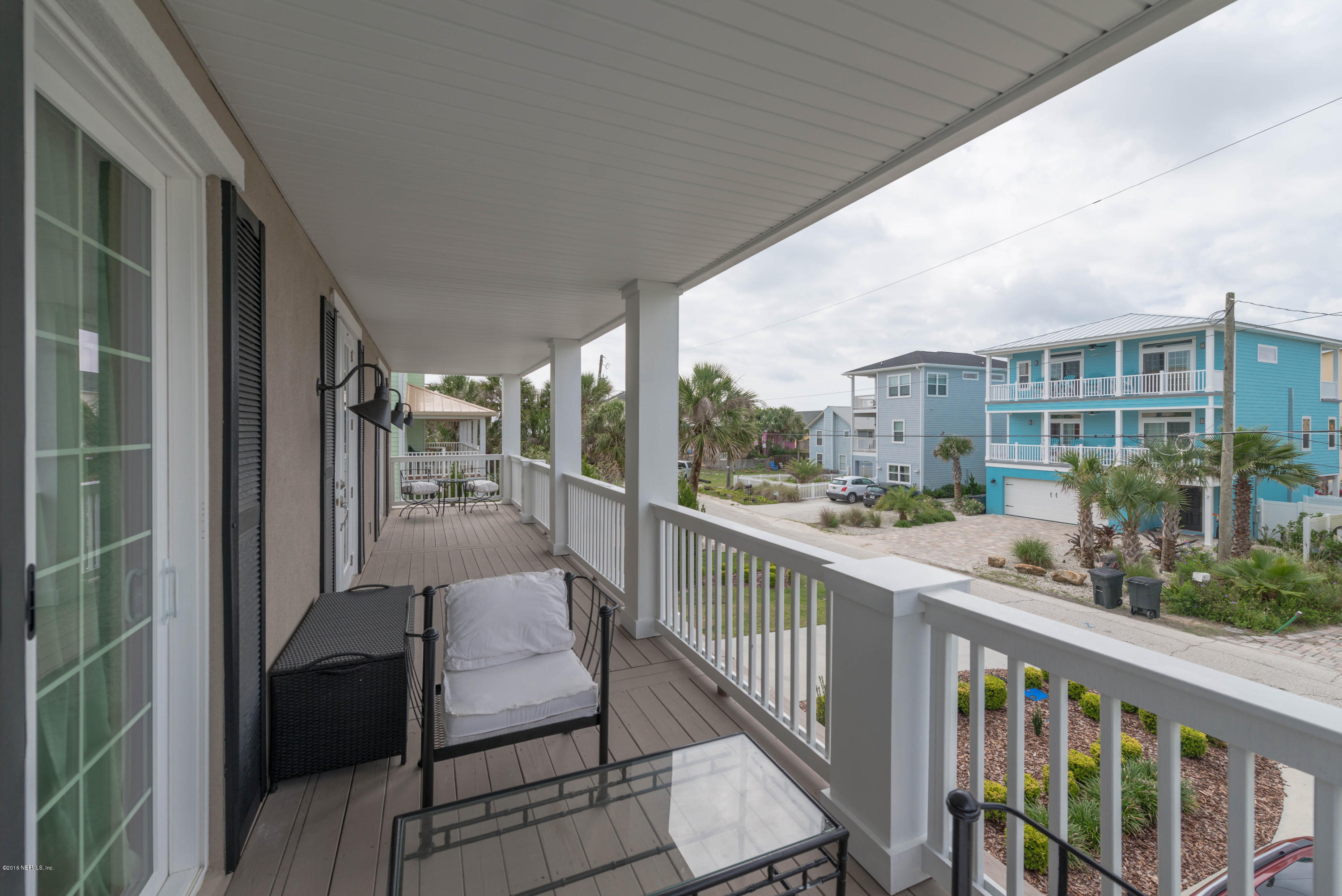 10 12th Street St. Augustine Beach, FL 32080 - Photo 14 of 45 a view of a balcony with furniture