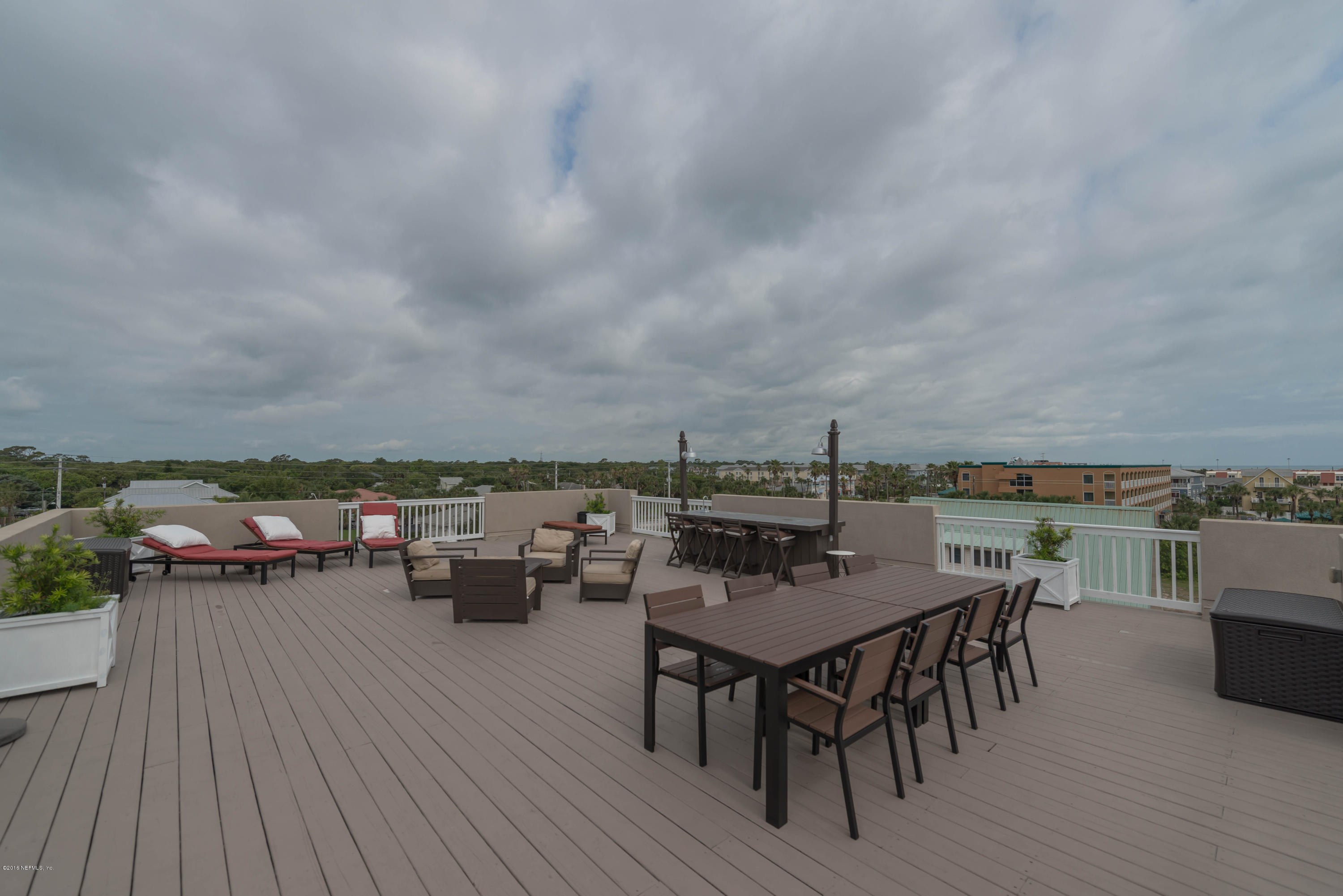 10 12th Street St. Augustine Beach, FL 32080 - Photo 23 of 45 an outdoor space with furniture and garden
