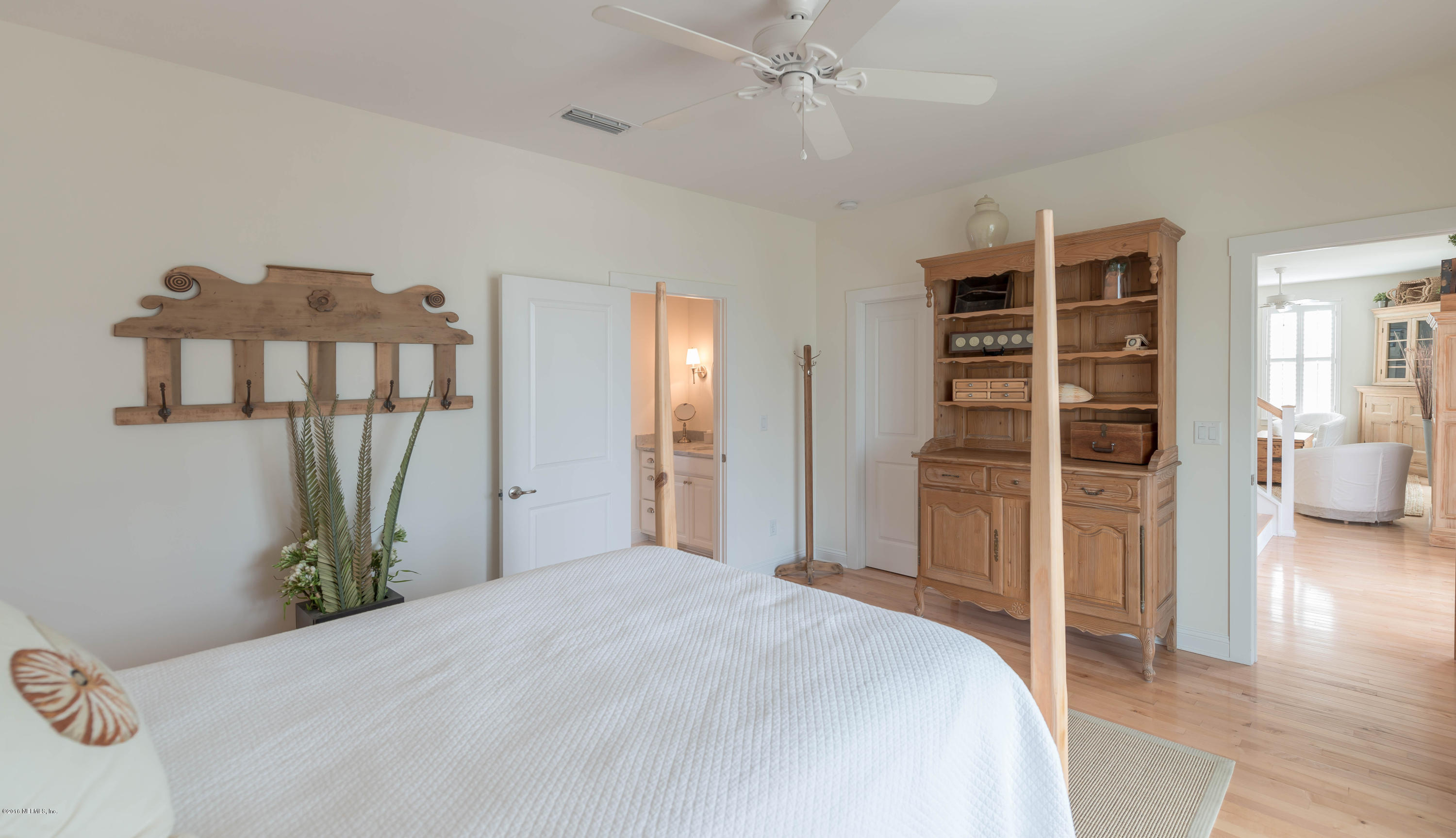 10 12th Street St. Augustine Beach, FL 32080 - Photo 38 of 45 a bedroom with a bed and a television