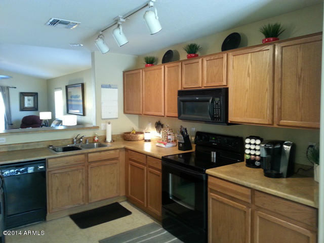 17798 West Calavar Road Surprise, AZ 85388 - Photo 8 of 25 kitchen 2