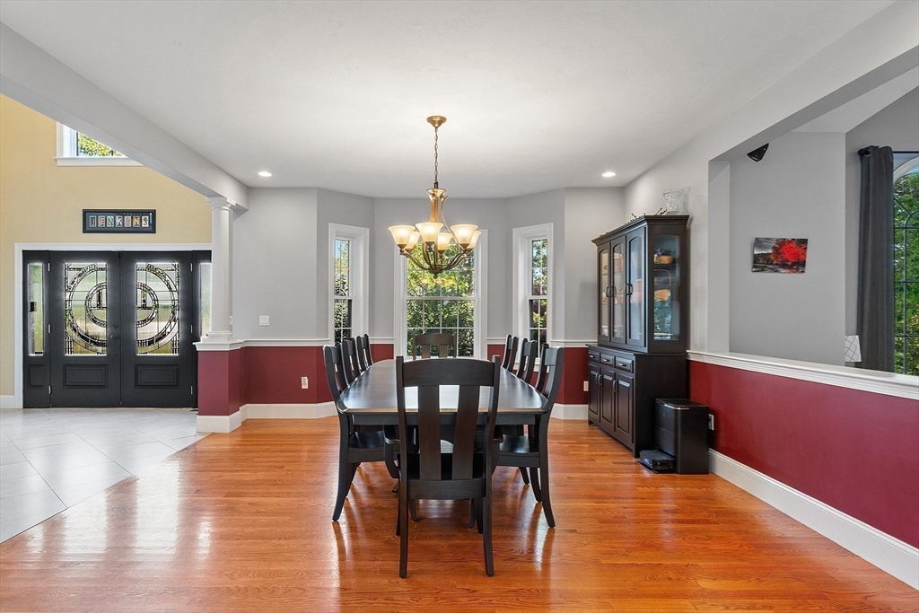 9 Winter Hill Road Lunenburg, MA 01462 - Photo 14 of 42 a view of a dining room with furniture window and wooden floor
