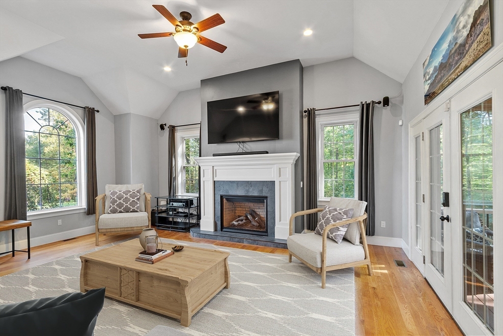 9 Winter Hill Road Lunenburg, MA 01462 - Photo 18 of 42 a living room with furniture fireplace and flat screen tv