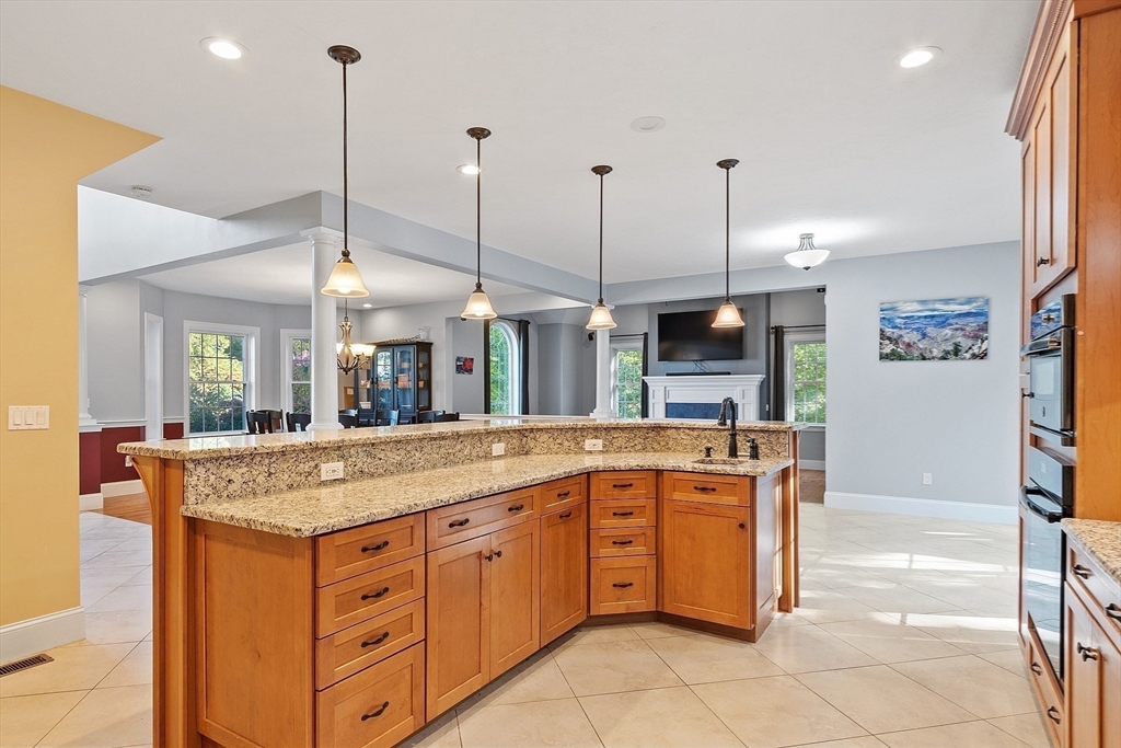 9 Winter Hill Road Lunenburg, MA 01462 - Photo 19 of 42 a kitchen with stainless steel appliances granite countertop a sink and a granite counter tops