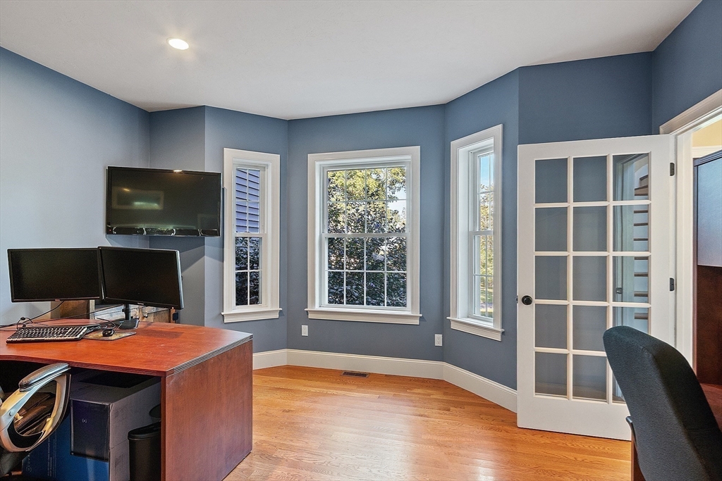 9 Winter Hill Road Lunenburg, MA 01462 - Photo 25 of 42 a view of a workspace with furniture and a window