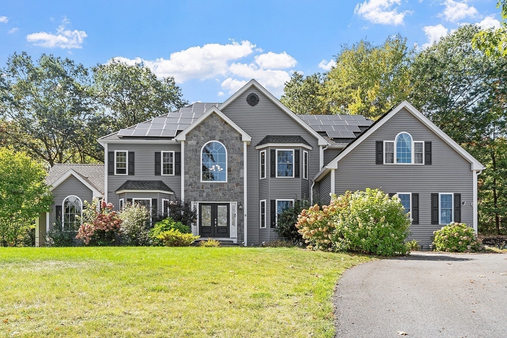 9 Winter Hill Road Lunenburg, MA 01462 - Photo 3 of 42 a front view of a house with garden