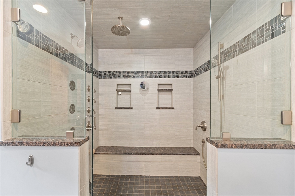 9 Winter Hill Road Lunenburg, MA 01462 - Photo 32 of 42 a bathroom with a granite countertop sink a mirror and shower