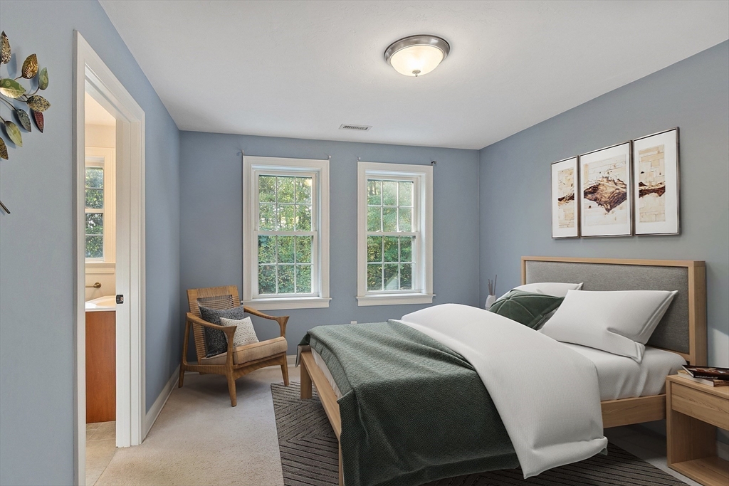 9 Winter Hill Road Lunenburg, MA 01462 - Photo 33 of 42 a bedroom with a bed and a large window